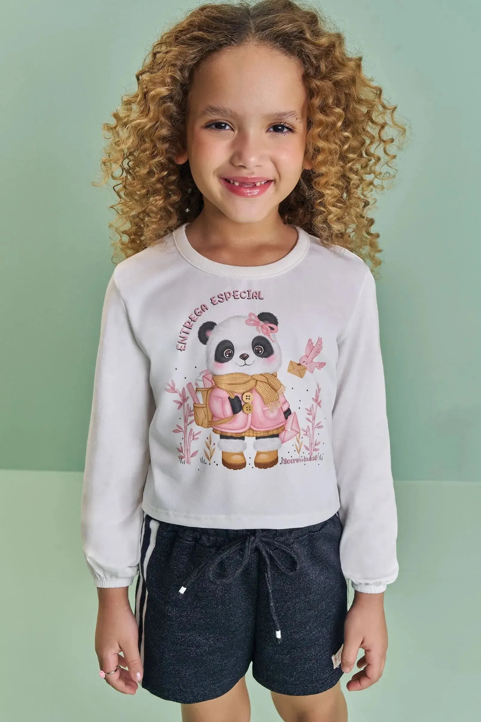 Conjunto de Blusa Boxy em Meia Malha e Shorts em Moletom Rajado sem Pelúcia 89535 Kukiê Infantil Menina