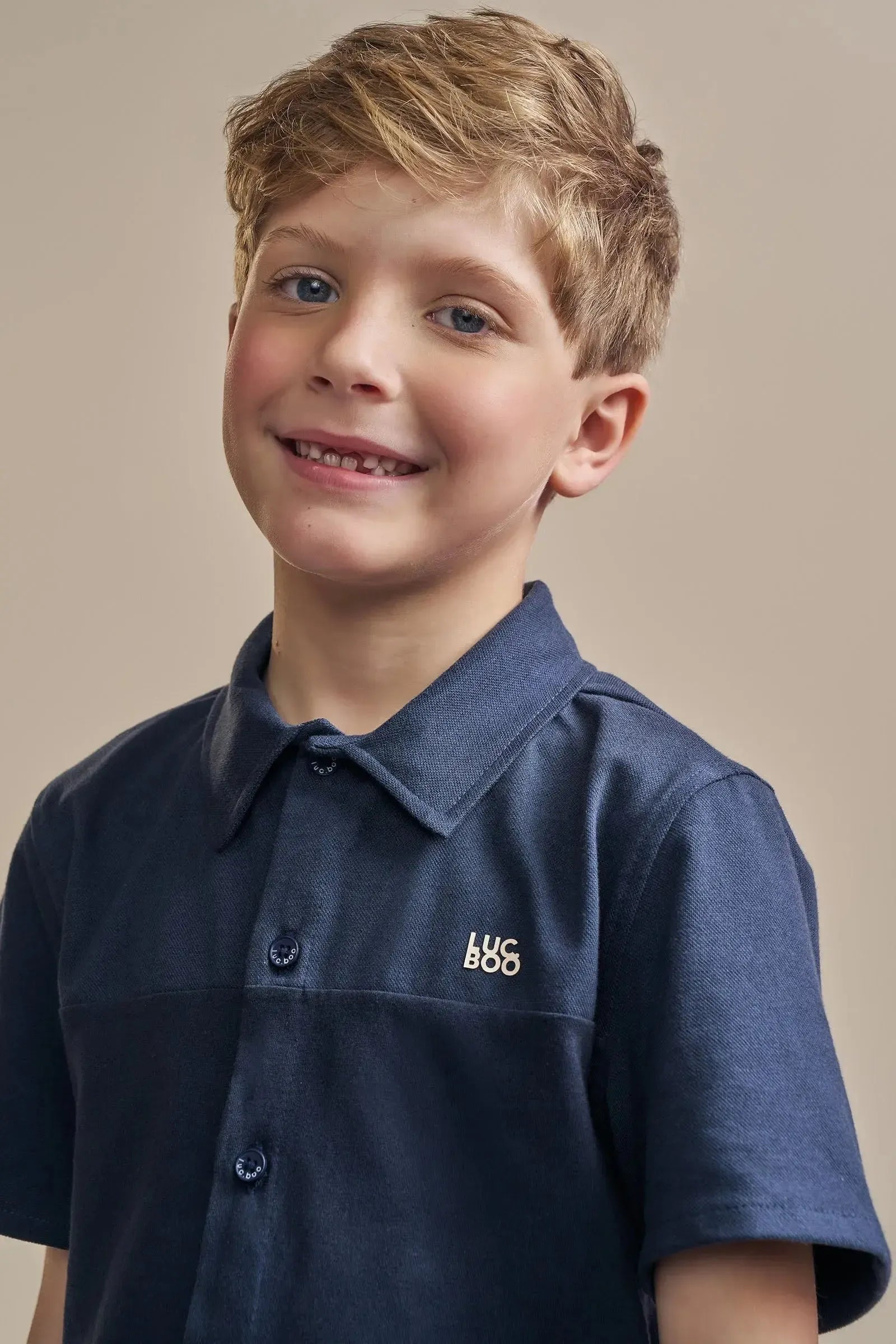 Conjunto de Camisa em Piquet com Elastano e Meia Malha e Bermuda em Tecido Sarjado 92425 LucBoo Infantil Menino