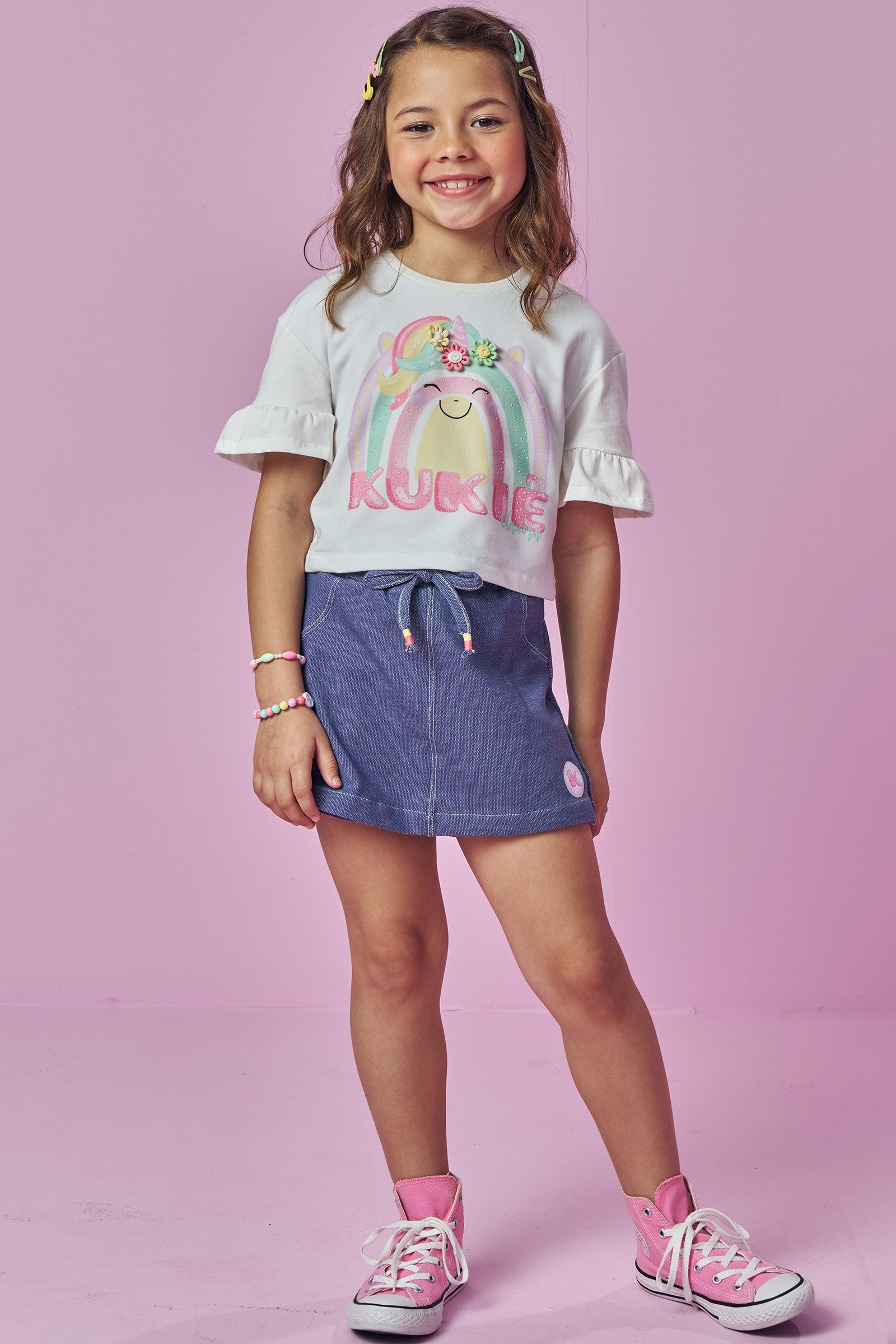 Conjunto de Blusa Boxy em Meia Malha e Short Saia em Malha Denim 93872 Kukiê Infantil Menina