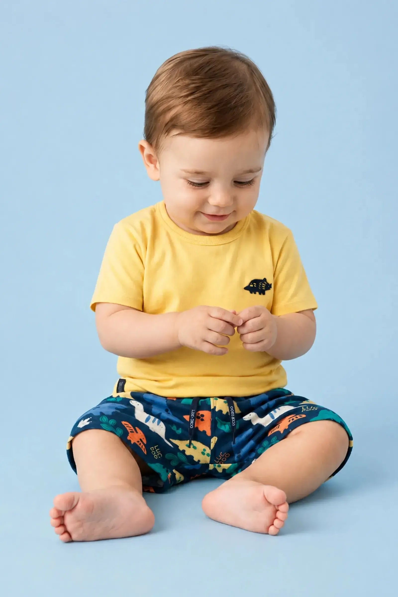 Conjunto de Camiseta em Meia Malha e Bermuda em Nylon Ergonomic com Elastano 94697 LucBoo Infantil Menino
