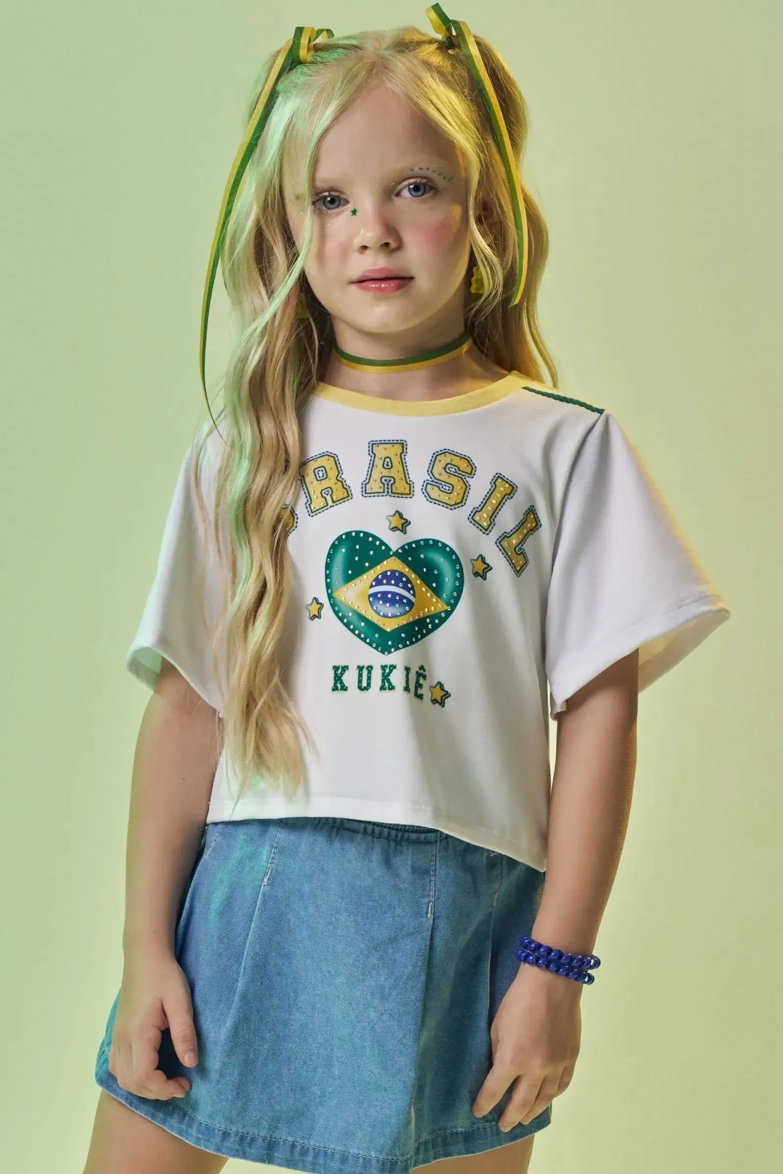 Blusa em Malha Power com Bandeira Do Brasil em Formato de Coração. Estampa Nas Costas com O Número Que Faz a Torcida Kukiê Brilhar. 99742 Kukiê Infantil Menina