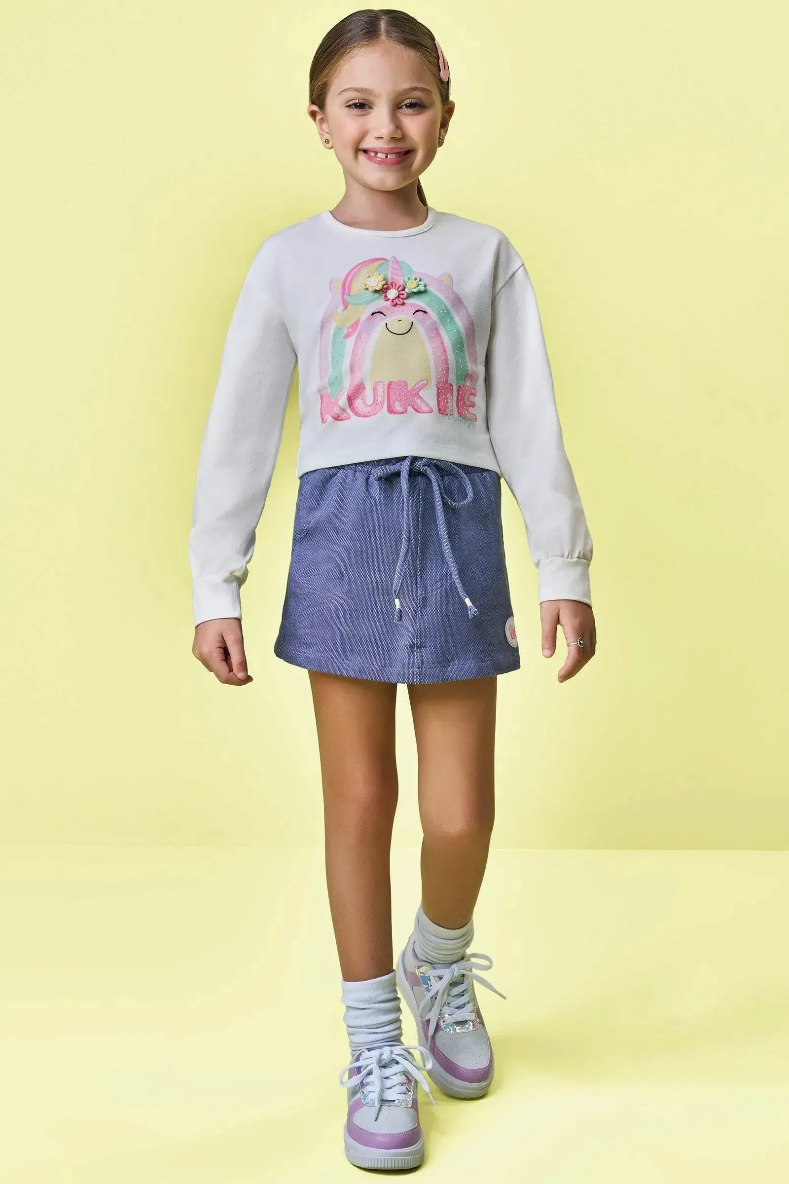 Conjunto de Blusa Boxy em Meia Malha e Short Saia em Malha Denin 90679 Kukiê Infantil Menina