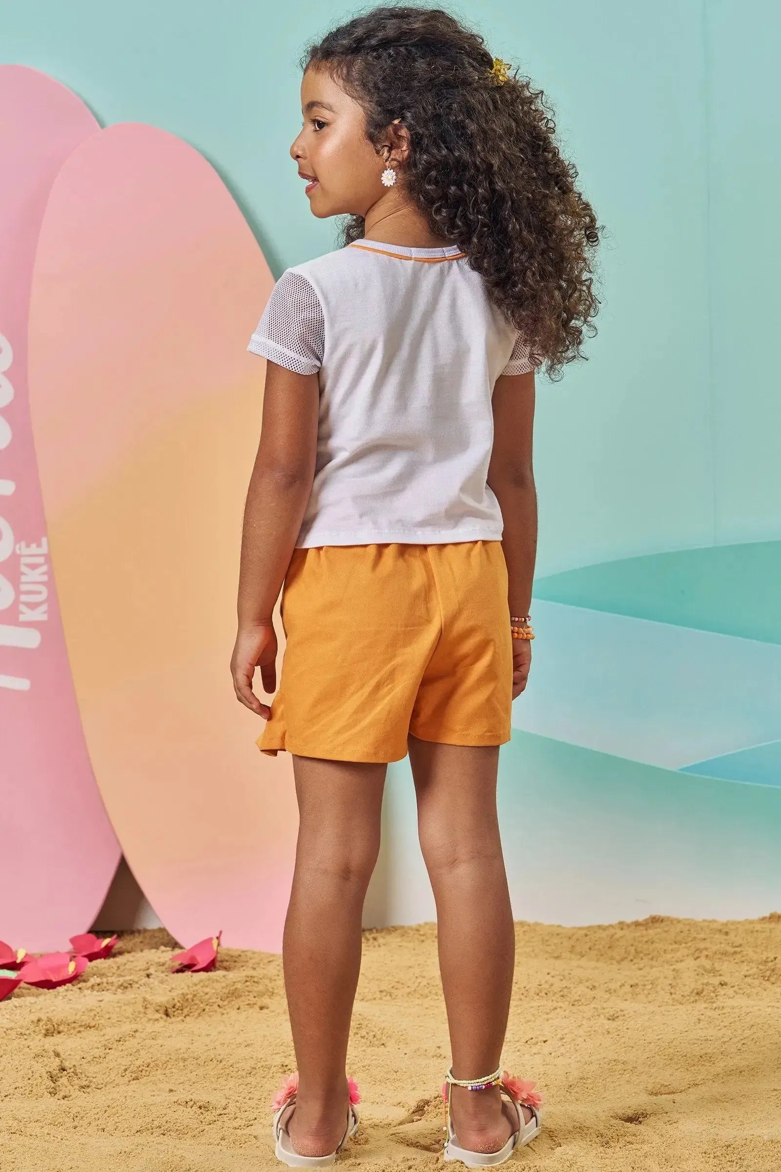 Conjunto de Blusa Boxy em Meia Malha e Tela Fashion e Short Saia em Sarja com Elastano 83948 Kukiê Infantil Menina