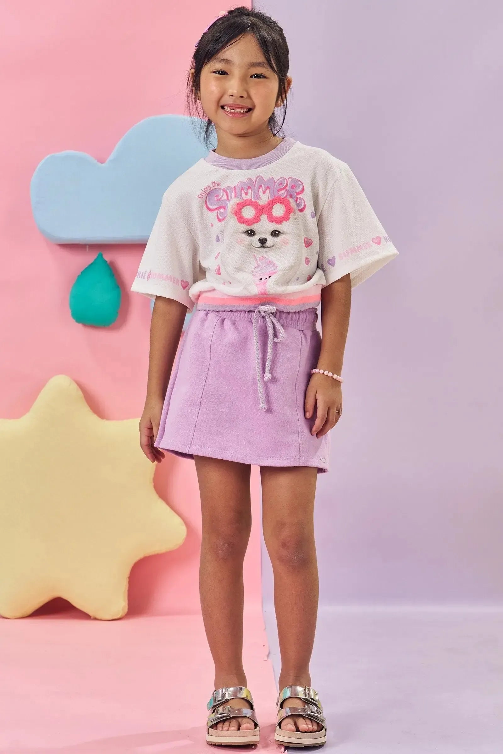 Conjunto de Blusa Boxy Over em Malha Favo e Short Saia em Moletom sem Pelúcia 84887 Kukiê Infantil Menina