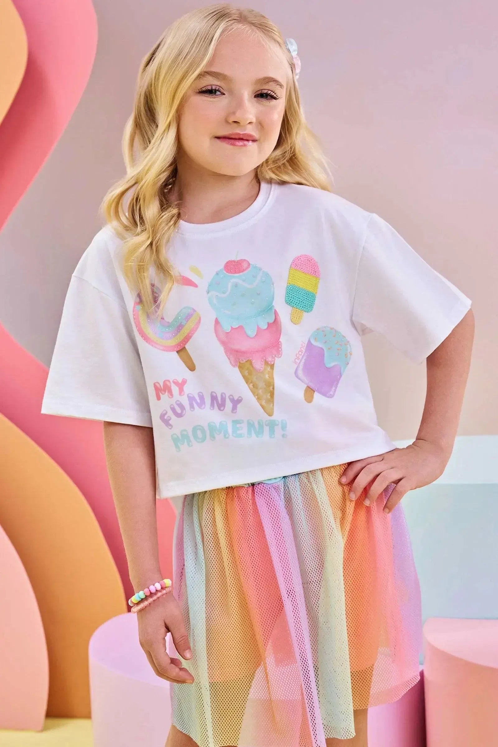 Conjunto de Blusa Boxy Over em Meia Malha e Saia em Tela. Com Shorts Embutido 83459 Infanti Infantil Menina