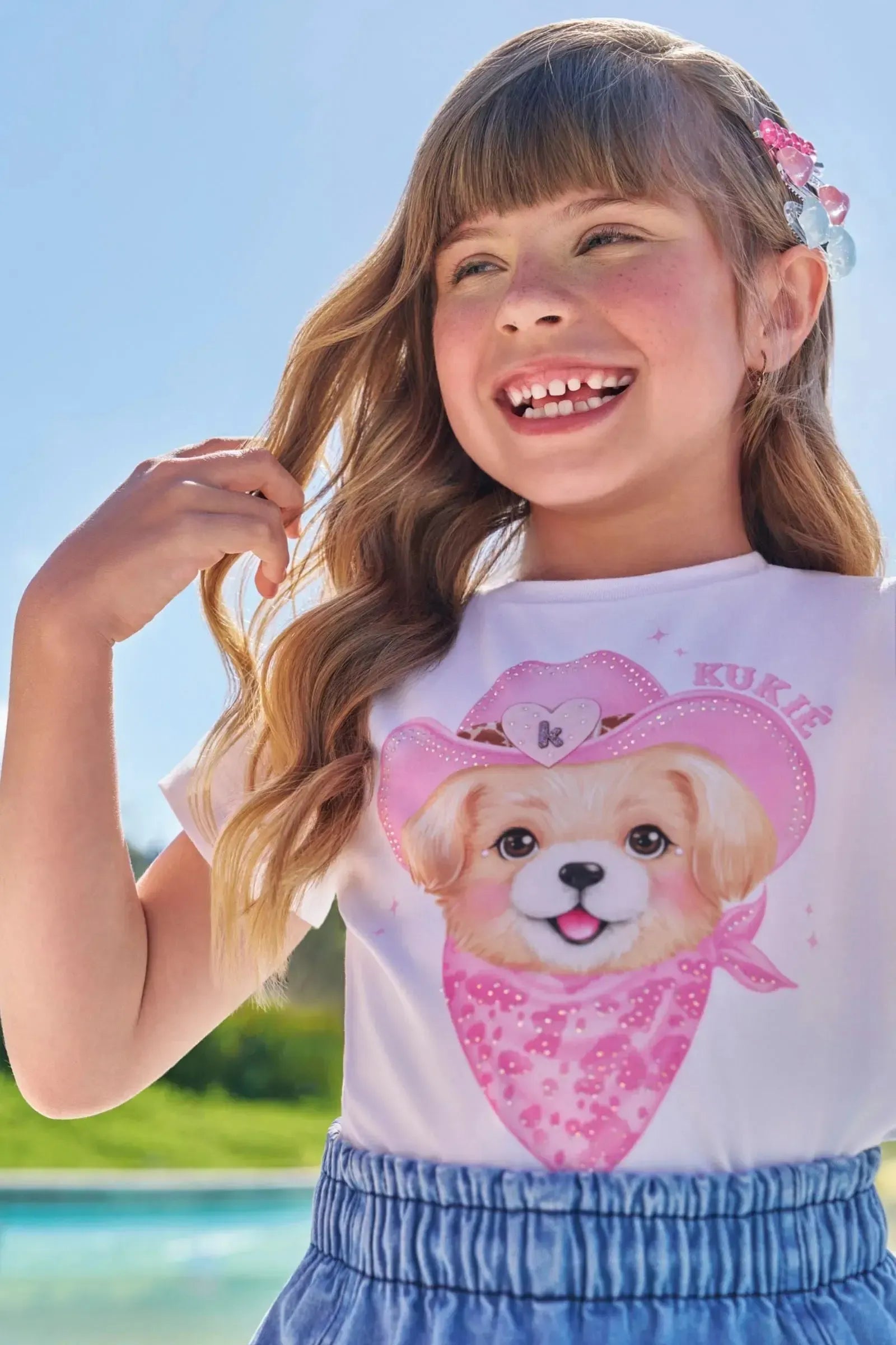 Conjunto de Blusa em Meia Malha e Short Saia em Jeans com Elastano 97132 Kukiê Infantil Menina