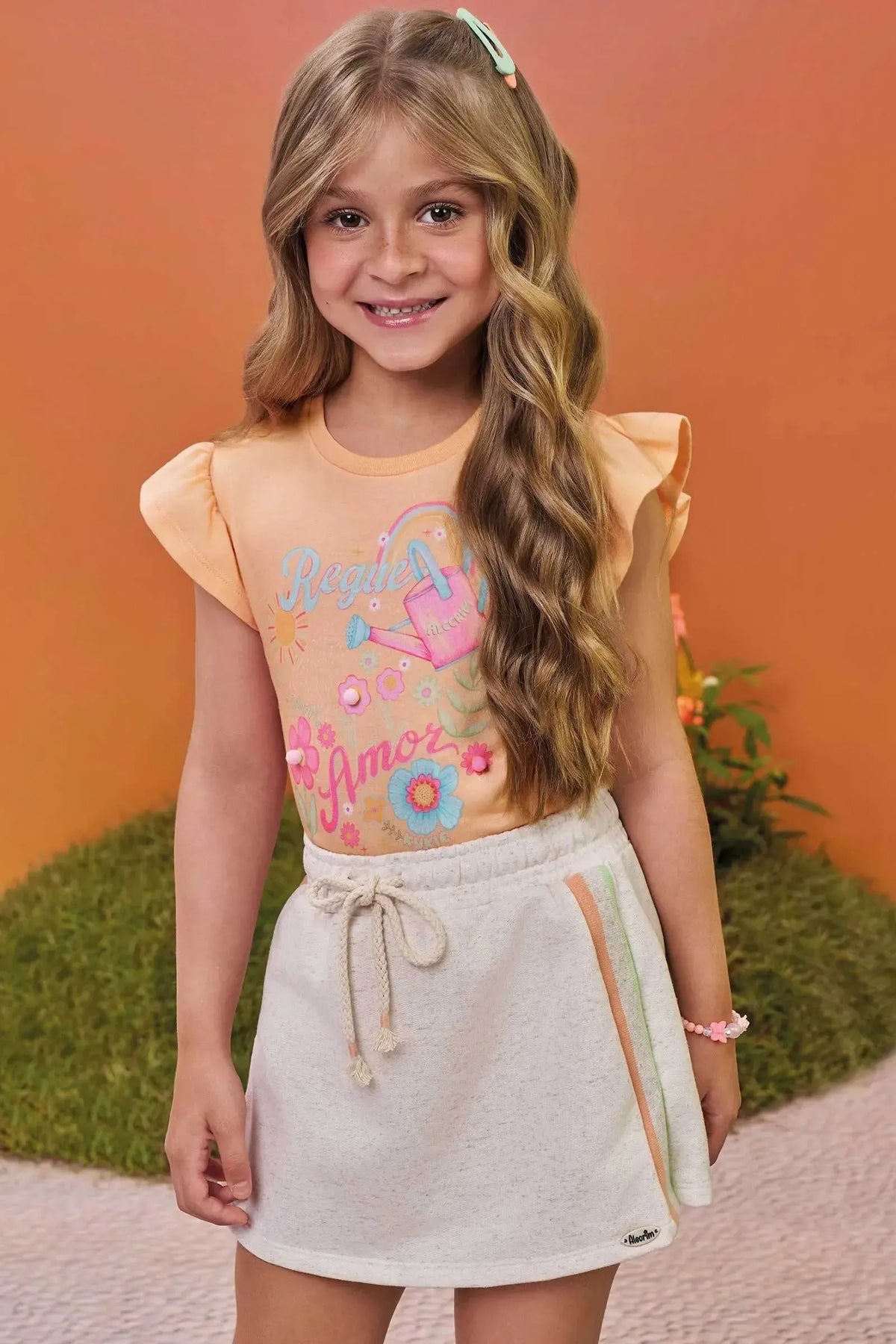 Conjunto de Blusa em Meia Malha e Short Saia em Moletom sem Pelúcia 98001 Kukiê Infantil Menina