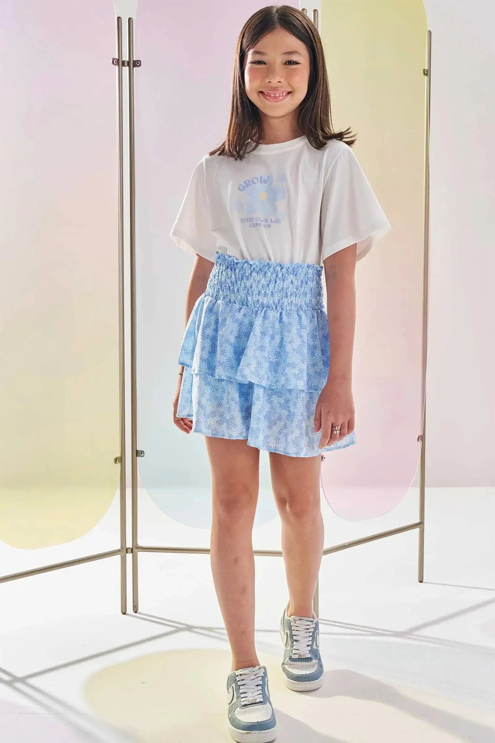Conjunto de Blusa Over em Meia Malha e Saia em Tecido Light Peach com Shorts Embutido 84404 Lilimoon Teen Menina