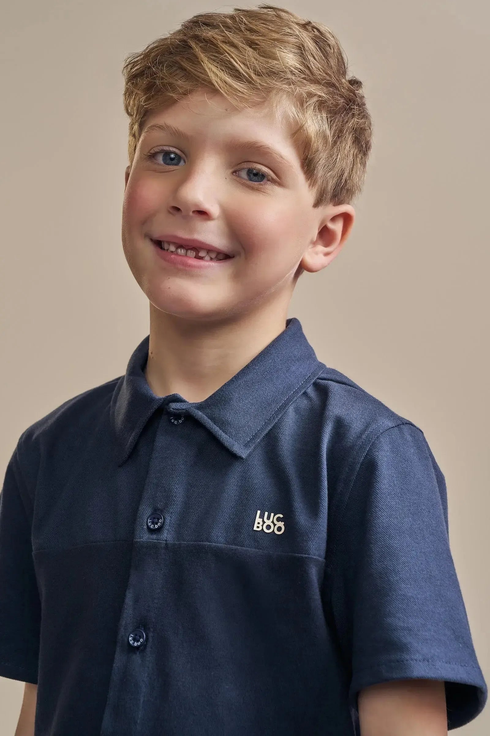 Conjunto de Camisa em Piquet com Elastano e Meia Malha e Bermuda em Tecido Sarjado 92425 LucBoo Infantil Menino