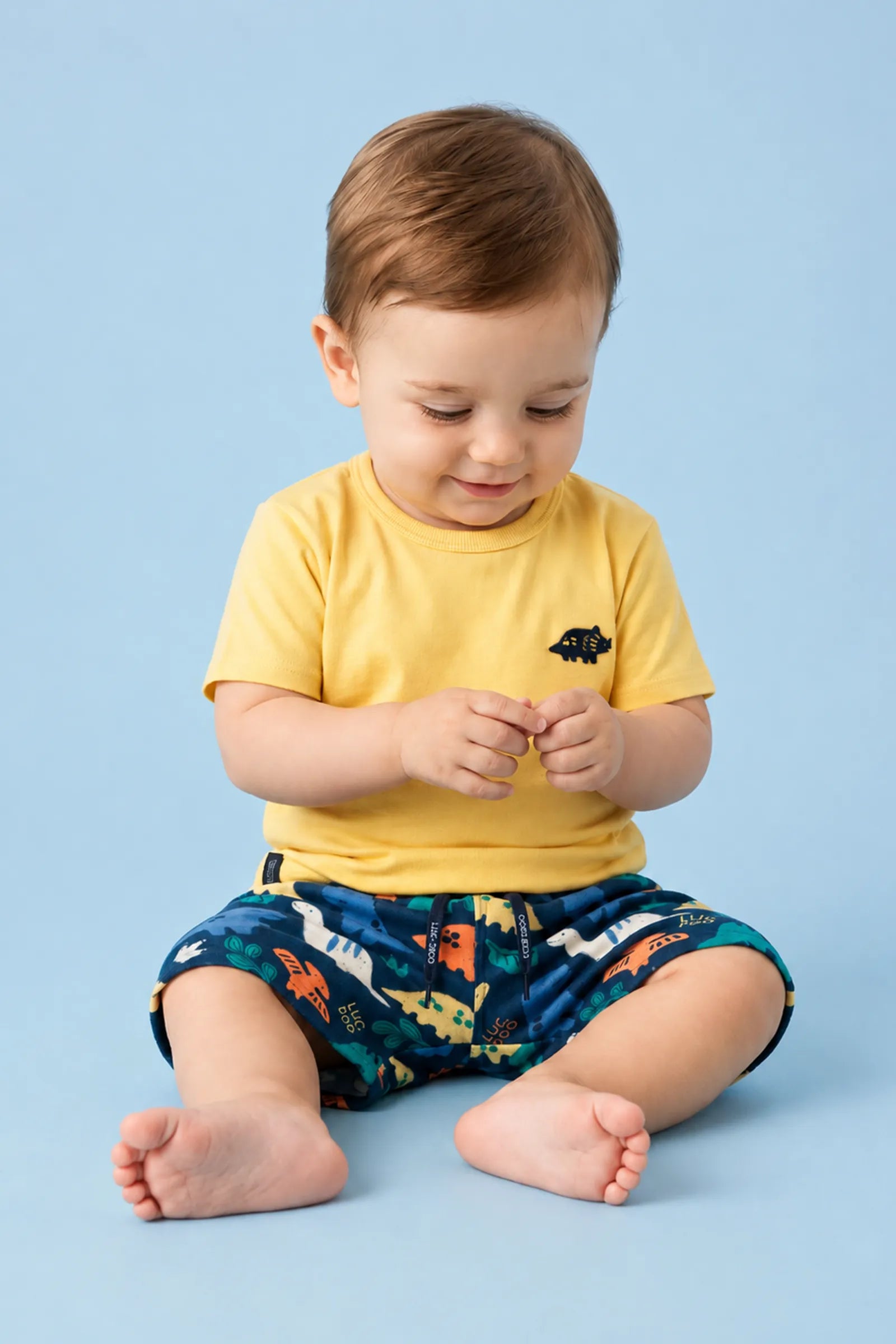 Conjunto de Camiseta em Meia Malha e Bermuda em Nylon Ergonomic com Elastano 94697 LucBoo Infantil Menino