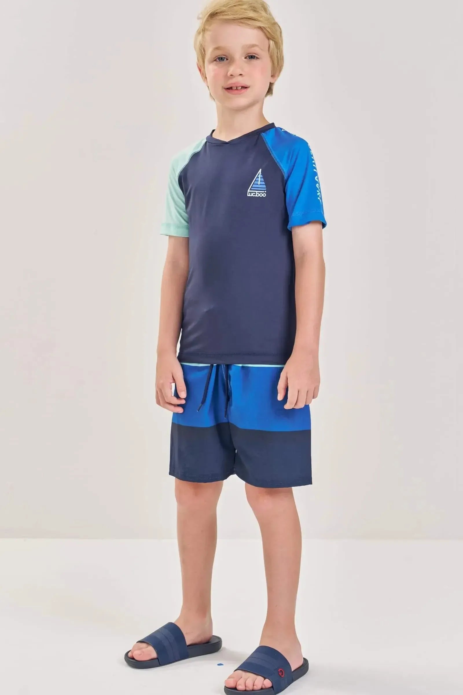Conjunto de Camiseta em Malha UV Dry com Proteção UV 50+ e Bermuda em Nylon com Elastano 87982 LucBoo Infantil Menino