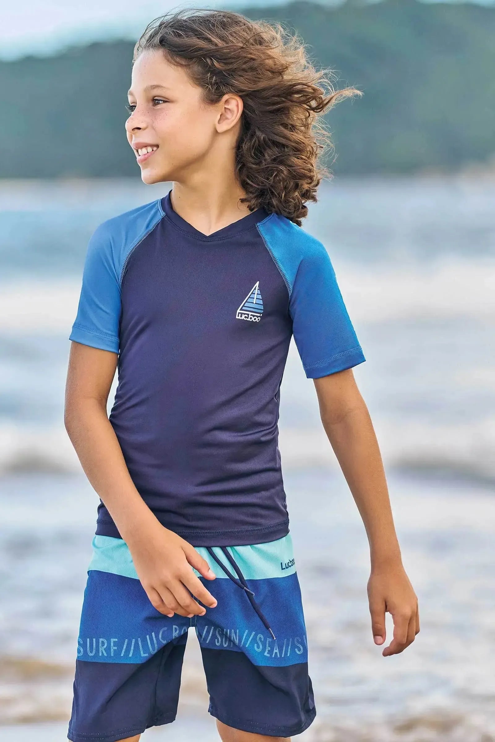 Conjunto de Camiseta em Malha UV Dry com Proteção UV 50+ e Bermuda em Nylon com Elastano 87982 LucBoo Infantil Menino
