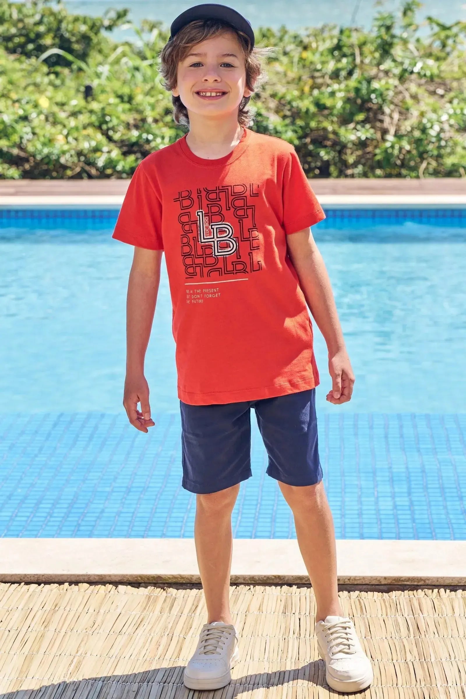 Conjunto de Camiseta em Meia Malha e Bermuda em Nylon Tecnospan com Elastano 84781 LucBoo Infantil Menino