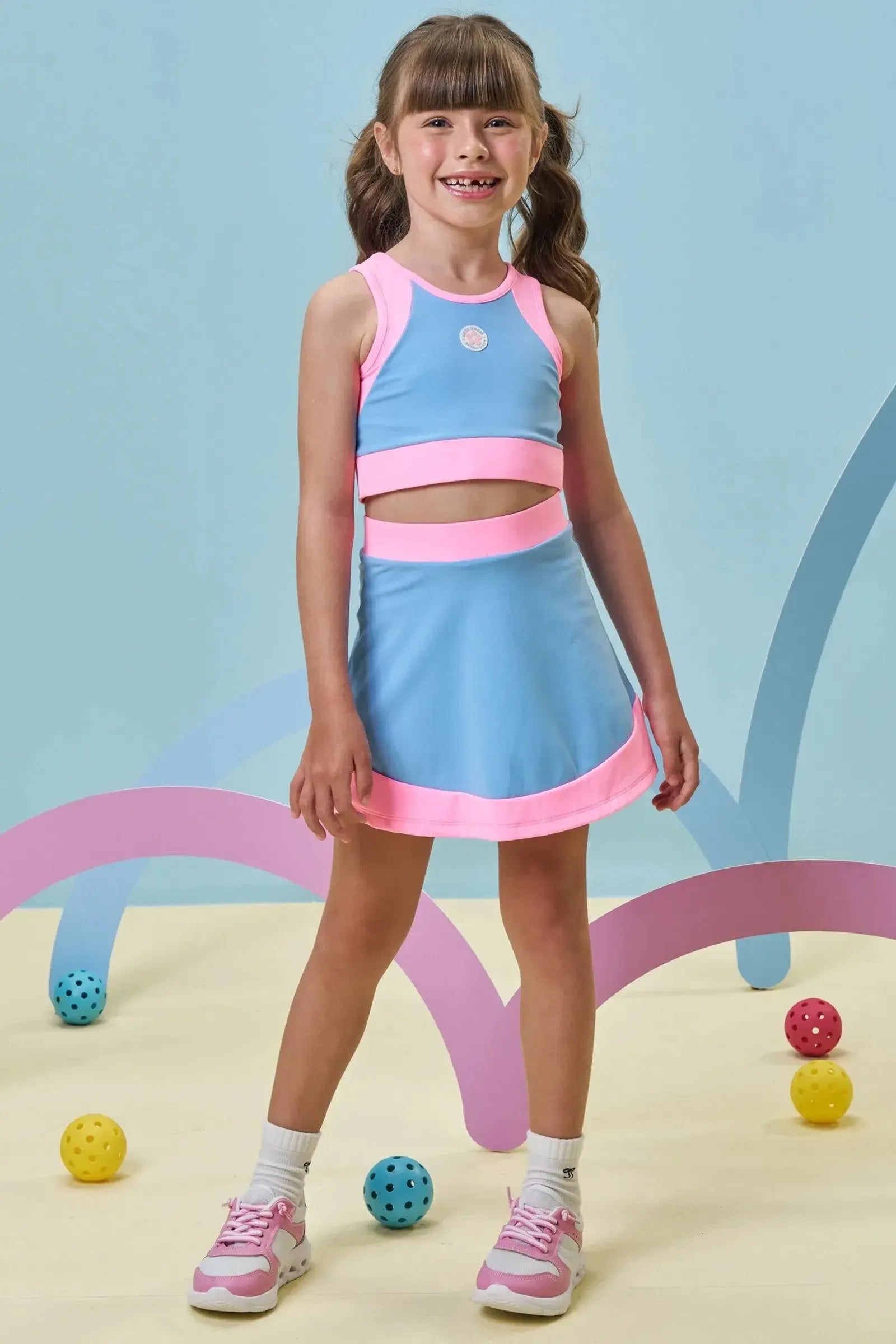 Conjunto de Top Cropped e Saia Esportiva em Poliamida (com Shorts Embutido) 96979 Kukiê Infantil Menina